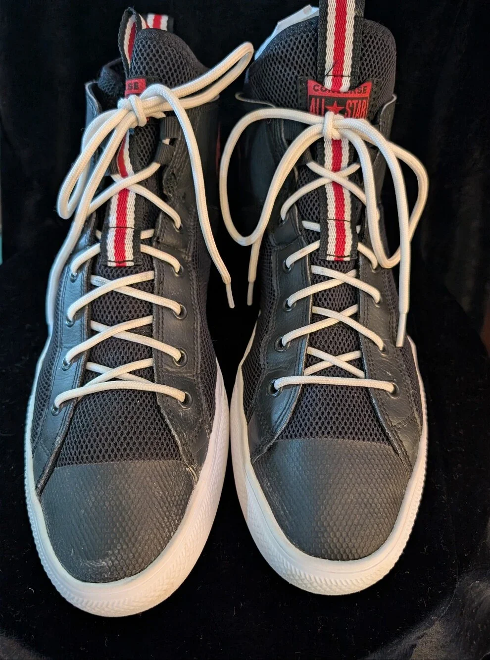 Converse Men’s Black High-Top Sneakers with White Laces and Red Stripe